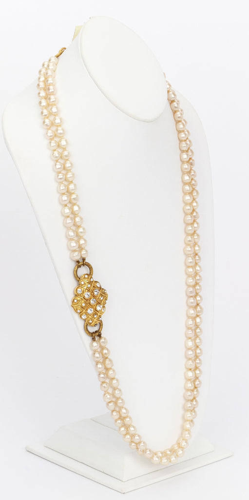 Chanel pearl necklace w/ gold medallion