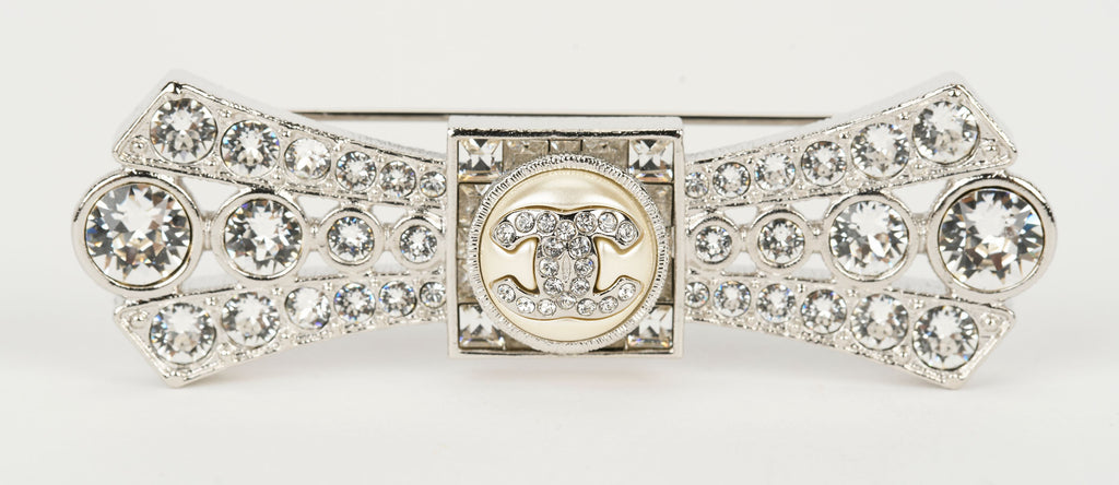 Chanel NIB Silver Box Crystal Logo Pin