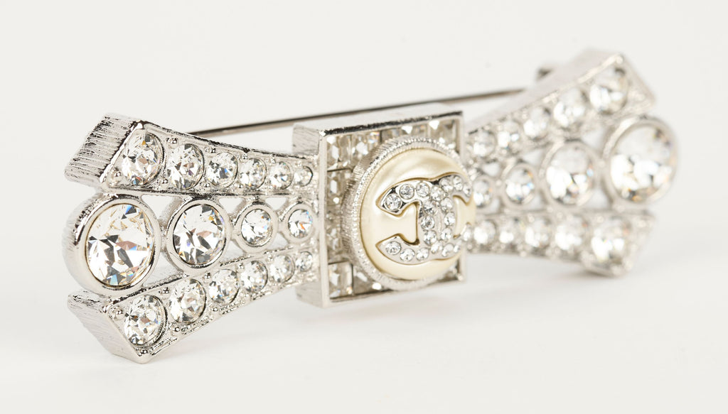 Chanel NIB Silver Box Crystal Logo Pin