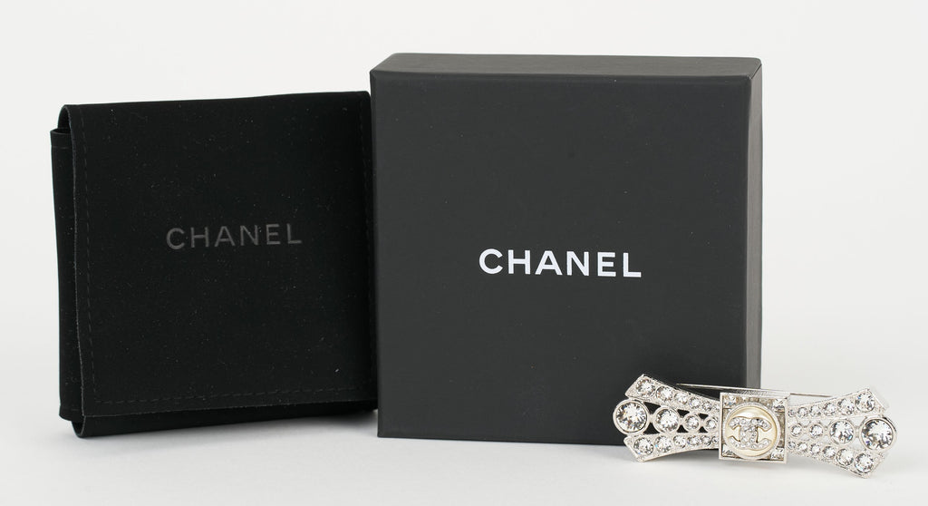 Chanel NIB Silver Box Crystal Logo Pin